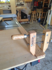 A panel sled and a clamp make repetitive cuts accurate and easy